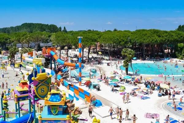 Aerial view of Union Lido Mare campsite with water slides, pools, and beach.
