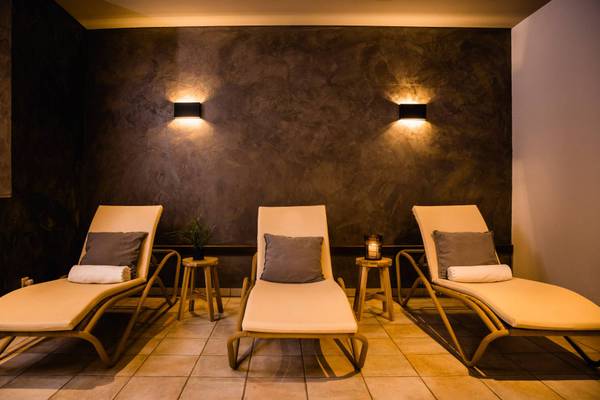 Aerial view of Camping Wirthshof campsite with many tents and houses.