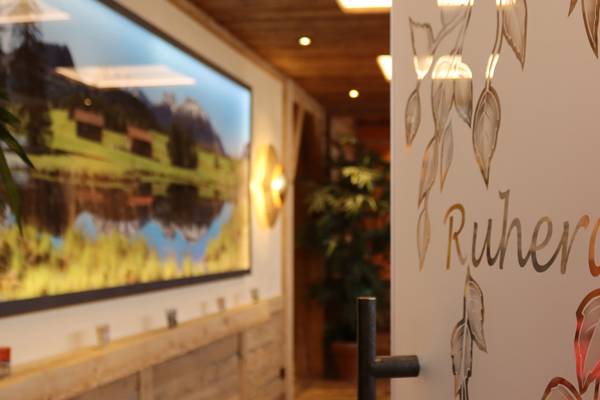 Indoor pool at Camping Hopfensee with a view of the mountains