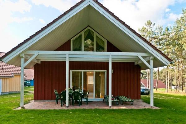 Holiday home in Camping- and Holiday Park Havelberge with terrace and garden furniture.