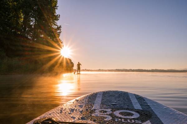 Strandcamping Waging am See SUP in the evening